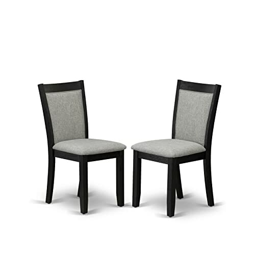 Two gray upholstered dining chairs with dark wood frames.