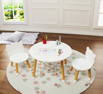 Children's table and chairs set in a playroom.