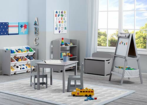 Children's playroom with table, chairs, and toys.