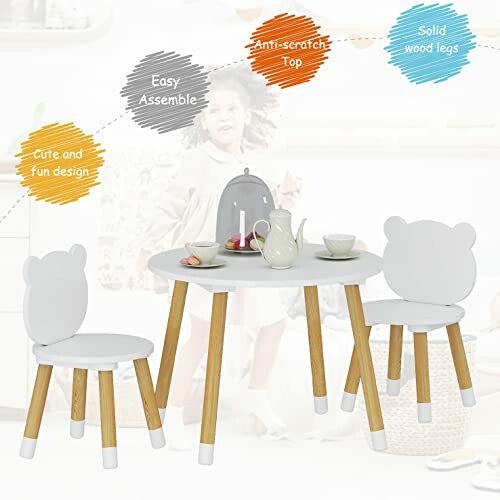 Children's table and chairs set with bear design, easy assemble, anti-scratch top, and solid wood legs.