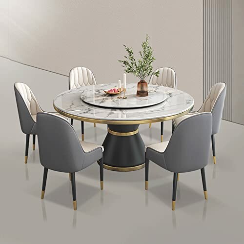 Elegant round marble dining table with six upholstered chairs.