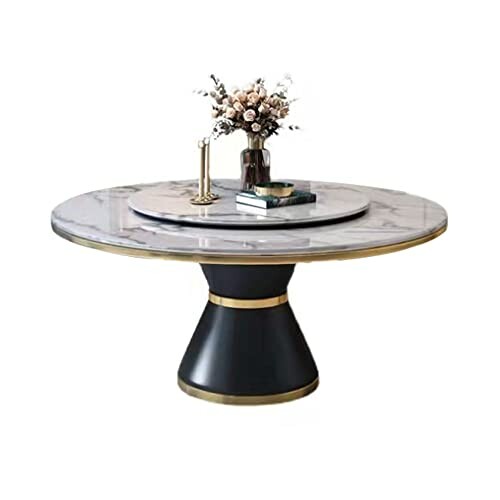 Round marble table with decorative centerpiece.