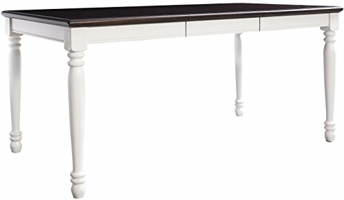 White wooden dining table with dark tabletop and turned legs