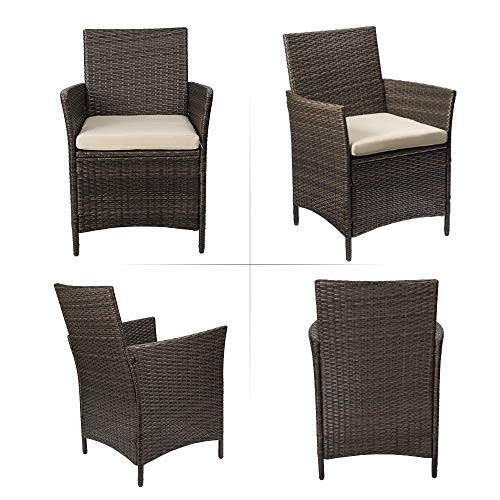 Set of four wicker patio chairs with cushions.